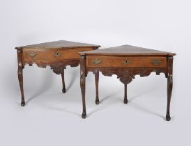 A pair of corner tables