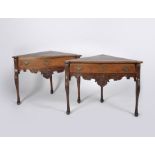 A pair of corner tables