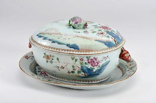 A large oval tureen with stand
