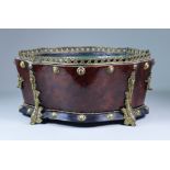 A Continental Burr Wood and Gilt Metal Mounted Oval Two-Handled Jardiniere, of serpentine outline