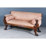 A William IV Rosewood Framed Settee, upholstered in rose cut dralon, the scroll arms with carved