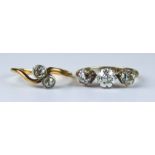 Two Late 19th/Early 20th Century 18ct Gold Diamond Rings, comprising - a three stone diamond ring,