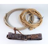 A U.S Leather .45 Calibre Cartridge Belt and Two Lariats, 19th Century, a leather cartridge/money