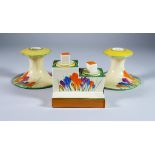 Crocus a Pair of Clarice Cliff Bizarre Candlesticks and a Double Inkwell, the candlesticks shape no.
