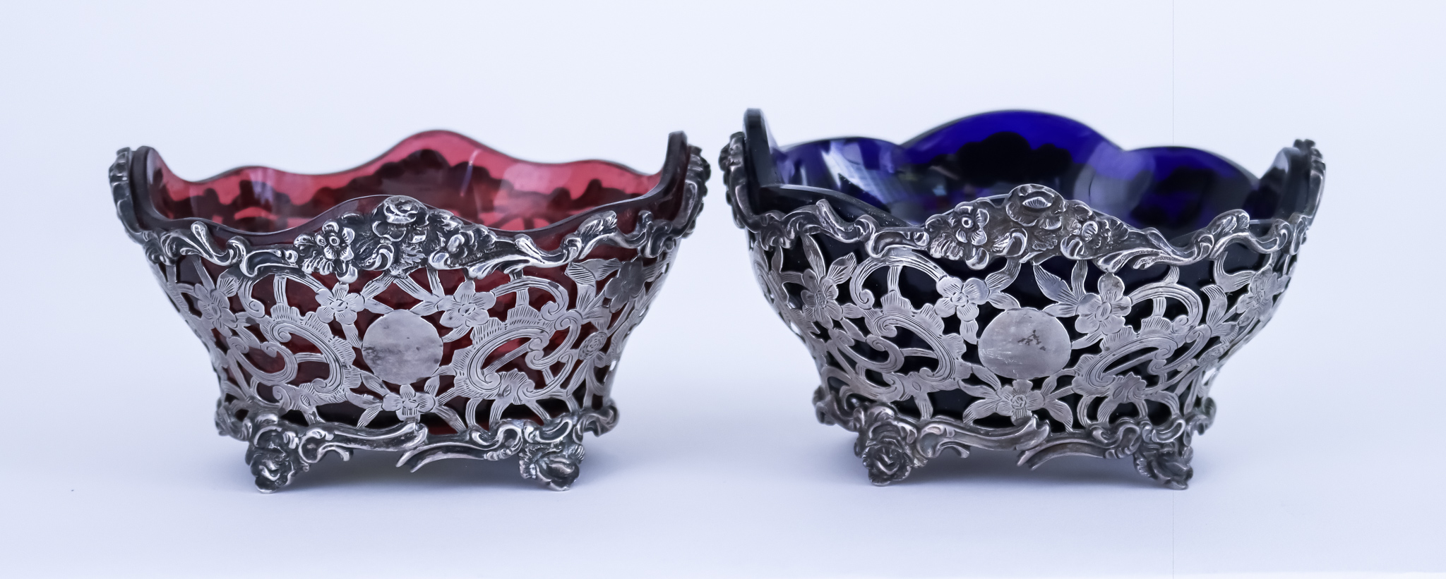 A Pair of Late Victorian Silver Oval Sweetmeat Baskets, by Charles Stuart Harris, London 1897, the