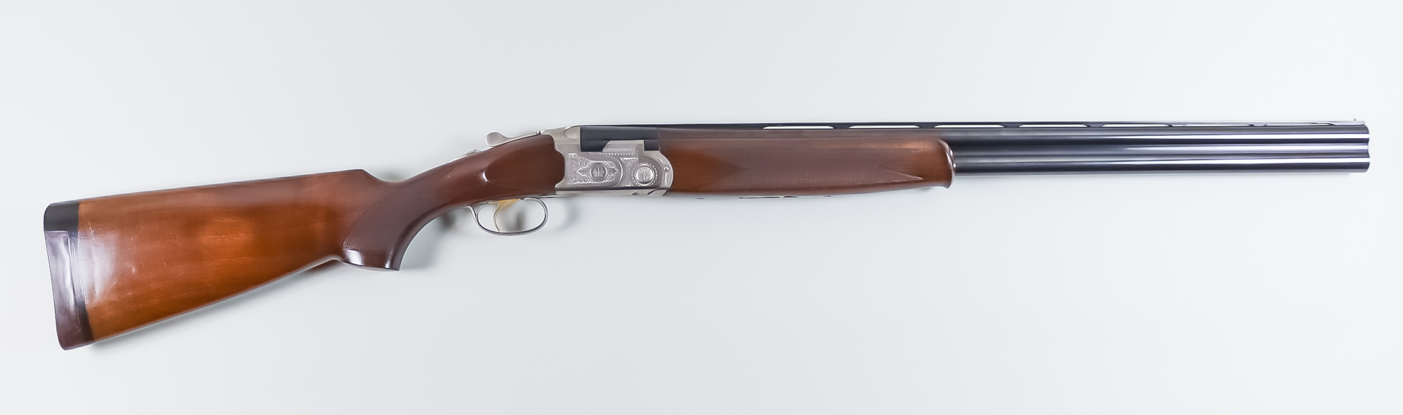 A 12 Bore Over and Under Shotgun by Berretta, Serial No. 86821, Model "Silver Pigeon", the 28ins