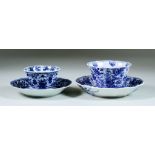 A Chinese Kangxi Blue and White Porcelain Tea Bowl and Saucer, painted with flowers and insects,