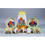 Crocus, a Clarice Cliff Bizarre Lynton Sugar Sifter, Two Napkin Rings, a Salt and Pepper Cruet and