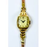 A Lady's Tiffany & Co. Cocktail Wristwatch, 20th Century, 14ct gold, 16mm x 16mm dial, with domed