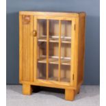 A 1930s Dwarf Display Cabinet/Open Bookcase, fitted two shelves enclosed by single glazed door,