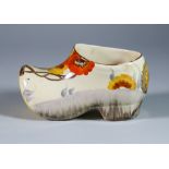 Rhodanthe, a Clarice Cliff Clog, painted in colours, 5.75ins wide x 3.25ins high, printed mark