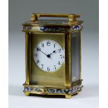 An Early 20th Century French Carriage Timepiece, the 1.325ins diameter white enamel dial with Arabic