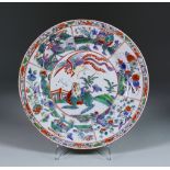 A Worcester Porcelain Plate, Circa 1770, enamelled in a famille verte palette after a Chinese