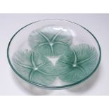 A Lalique Pale Green Opalescent and Clear Glass Dish of Volubilis Pattern, No. 383, moulded with
