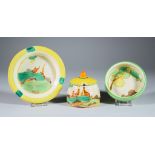 Secrets, a Clarice Cliff Fantasque Bizarre Beehive Honey Pot, Coaster and a Bizarre Ashtray, the