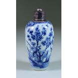 A Chinese Kangxi Blue and White Porcelain Ovoid Vase, painted with flowering rock work, with