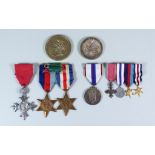 A Group of Four Medals to James Sydney Cousins, comprising - Elizabeth II MBE with Citation,