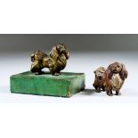 An Austrian Bronze Model of a Pekingese with Glass Eyes, Late 19th/Early 20th Century, on green