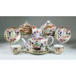 A Coalport Porcelain Part Tea Service, Circa 1810, painted and gilded with an Imari design,