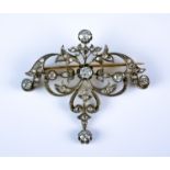 A Diamond Set Scroll Brooch, Late 19th/Early 20th Century, 14ct white gold set with old European cut