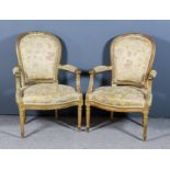 A Pair of French Gilt Framed Fauteuil of Louis XV Design, seats, backs and arms upholstered in old