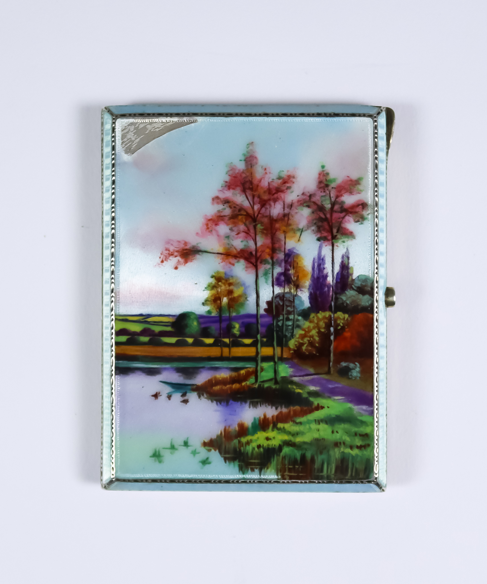 An Early 20th Century Continental Silver, Silver Gilt and Enamel Rectangular Cigarette Case, with
