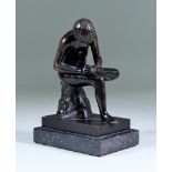Late19th/Early 20th Century Continental School - Bronze figure of the Spinario, on polished black