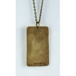 A 9ct Gold "Dog Tag" Pendant and Chain, Modern, the tag being 40mm x 22mm suspended from a 540mm