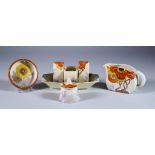 Rhodanthe, a Clarice Cliff Bizarre Bonjour Three Piece Cruet Set, a Conical Mustard Pot and Cover, a