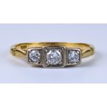 A Three Stone Diamond Ring, Modern, 18ct gold set with three brilliant cut white diamonds,