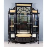 A Late Victorian Ebonised and Parcel Gilt Wall Unit in the 'Aesthetic' Manner, the central section