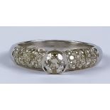 A Diamond Ring, Modern, 18ct white gold set with a centre brilliant cut round diamond, approximately