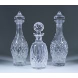 Two Waterford Wine Decanters and Stoppers of Boyne Pattern, 13ins high, and a Lismore spirit