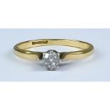 A Solitaire Diamond Ring, Modern, 18ct yellow gold mount set with a brilliant round cut diamond,