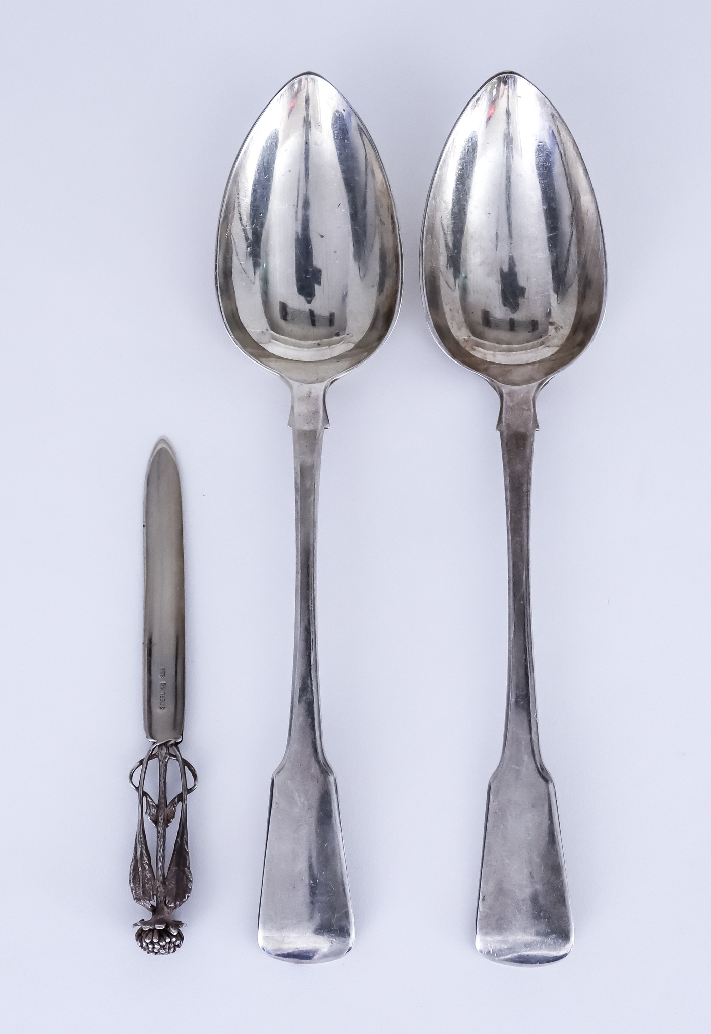 A Pair of Late George III Silver Fiddle Pattern Table Spoons and a Sterling Silver Paper Knife,