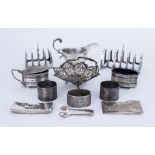 A George VI Silver Six Division and a Four Division Rectangular Toast Rack, and Mixed Silverware,