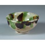 A Small Sancai Pottery Cup, 7th/8th Century (Tang), .75ins (7cm) diameter x 1.25ins (3.2cm) high