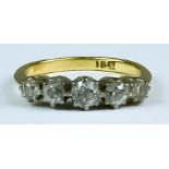 A Five Stone Diamond Ring, 20th Century, 18ct yellow gold set with five brilliant cut white