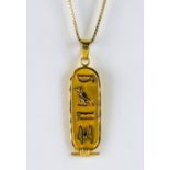 A 20th Century Egyptian Pendant, yellow metal, 34mm x 10mm, suspended from a fine chain 430mm, gross