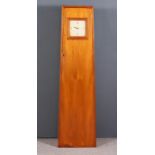 A 1930s Oak and Teak Longcase Clock, the cream square dial with Arabic numerals to twelve, three,