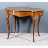 A French Kingwood, Marquetry and Metal Mounted Rectangular Table, of serpentine outline, fitted