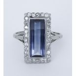 A Sapphire and Diamond Ring, Modern, 18ct white gold set with an unusual oblong sapphire,