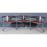 Three Chrome Metal Framed Semi-Circular Easy Chairs, with wicker covered crest rails, seats