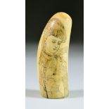 A Scrimshaw Whale's Tooth, 19th Century, worked with the portrait of a young lady wearing a
