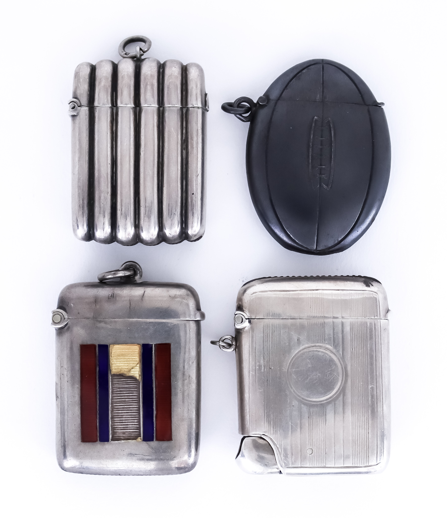 A George V Silver Combination Vesta Case/Cigar Cutter and a Selection of Vesta Cases, the