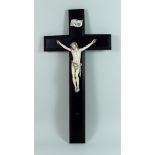 I* A French Ivory Corpus Christi, 19th Century, finely carved, on stained wood cross with ivory