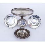 A George V Silver Circular Tazza, Three Silver "Armada" Dishes and a Coaster, the tazza by I.S.