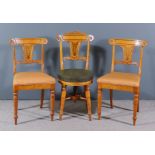 A William IV Maple and Satin Birch Music Chair and a Pair of Matching Single Chairs, the curved