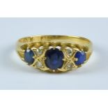 A Three Stone Sapphire and Diamond Ring, 20th Century, 18ct gold set with three sapphires,