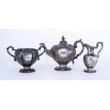 A Victorian Scottish Silver Three-piece Tea Service, by J.M. Glasgow 1852, of bulbous panelled form,